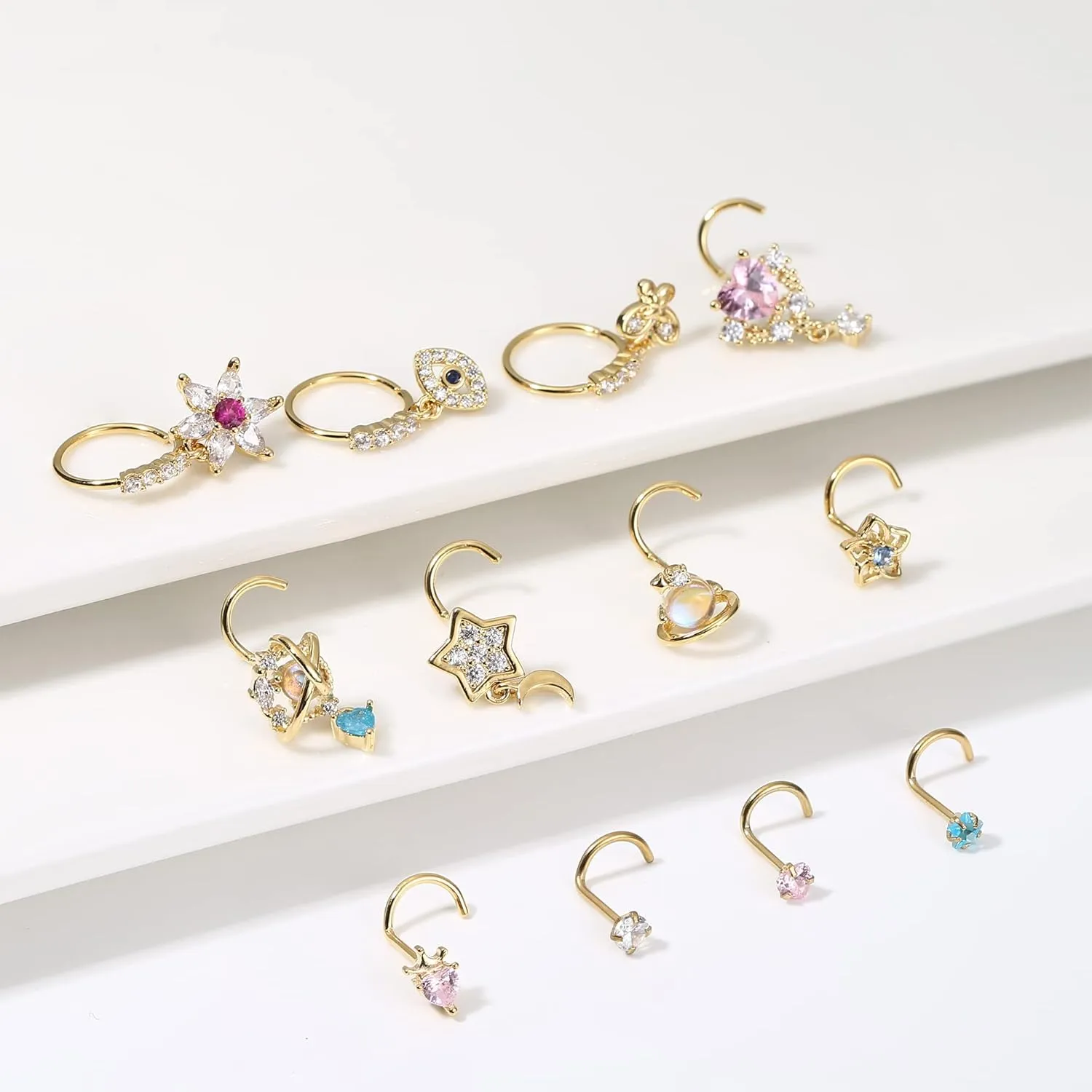 JOERICA 12 Pcs 20G Dangle Nose Rings and Studs for Women - L Shaped Stainless Steel Hoops With Butterfly, Heart, Moon, Flower, Evil Eye, Crown CZ Dangling Piercing Jewelry