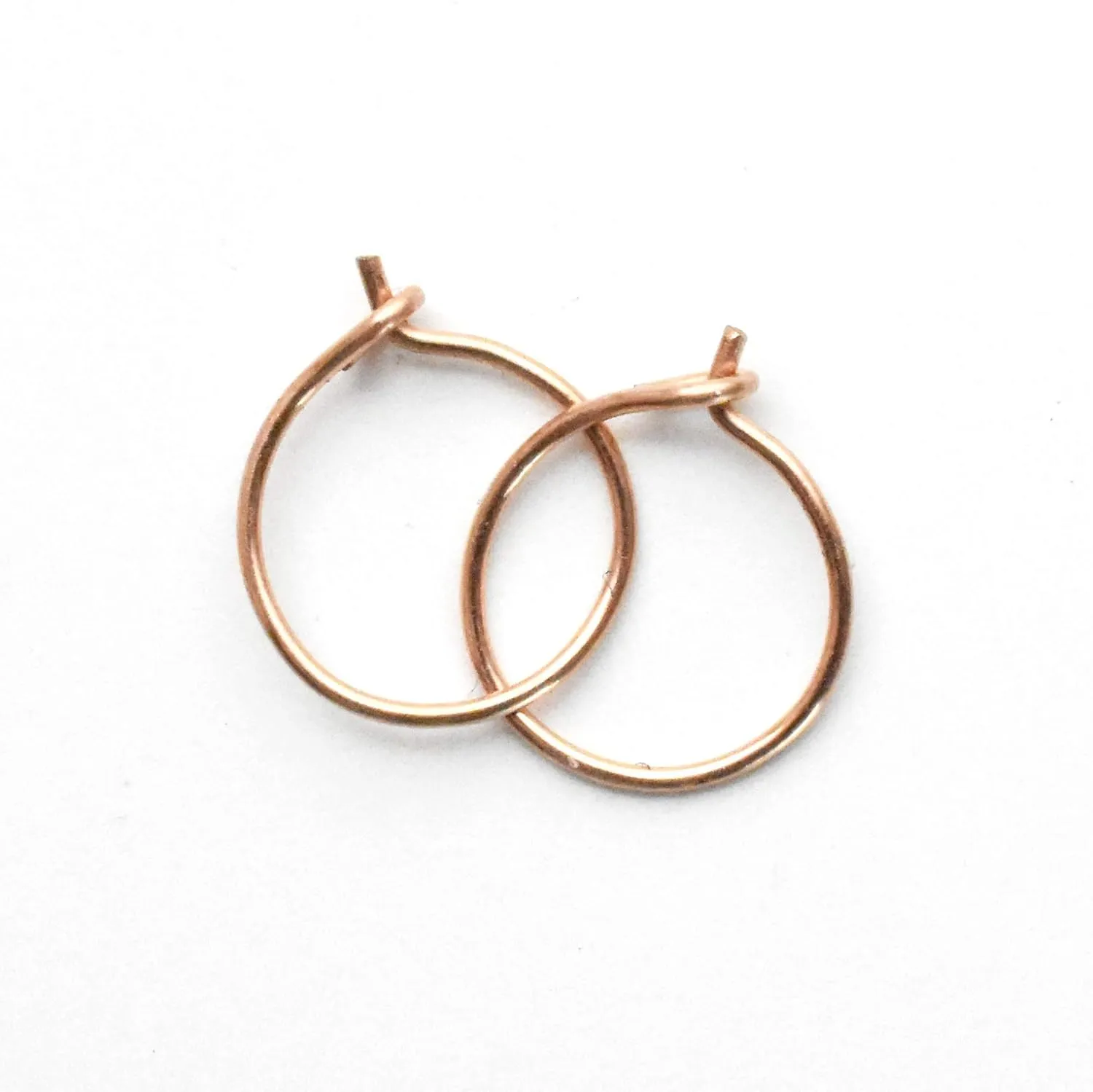 Tiny 14k Rose Gold Fill Hoops 8mm, 24 gauge Handmade Minimalist Earrings in Pink Gold. Hypoallergenic Huggie Hoop Earrings